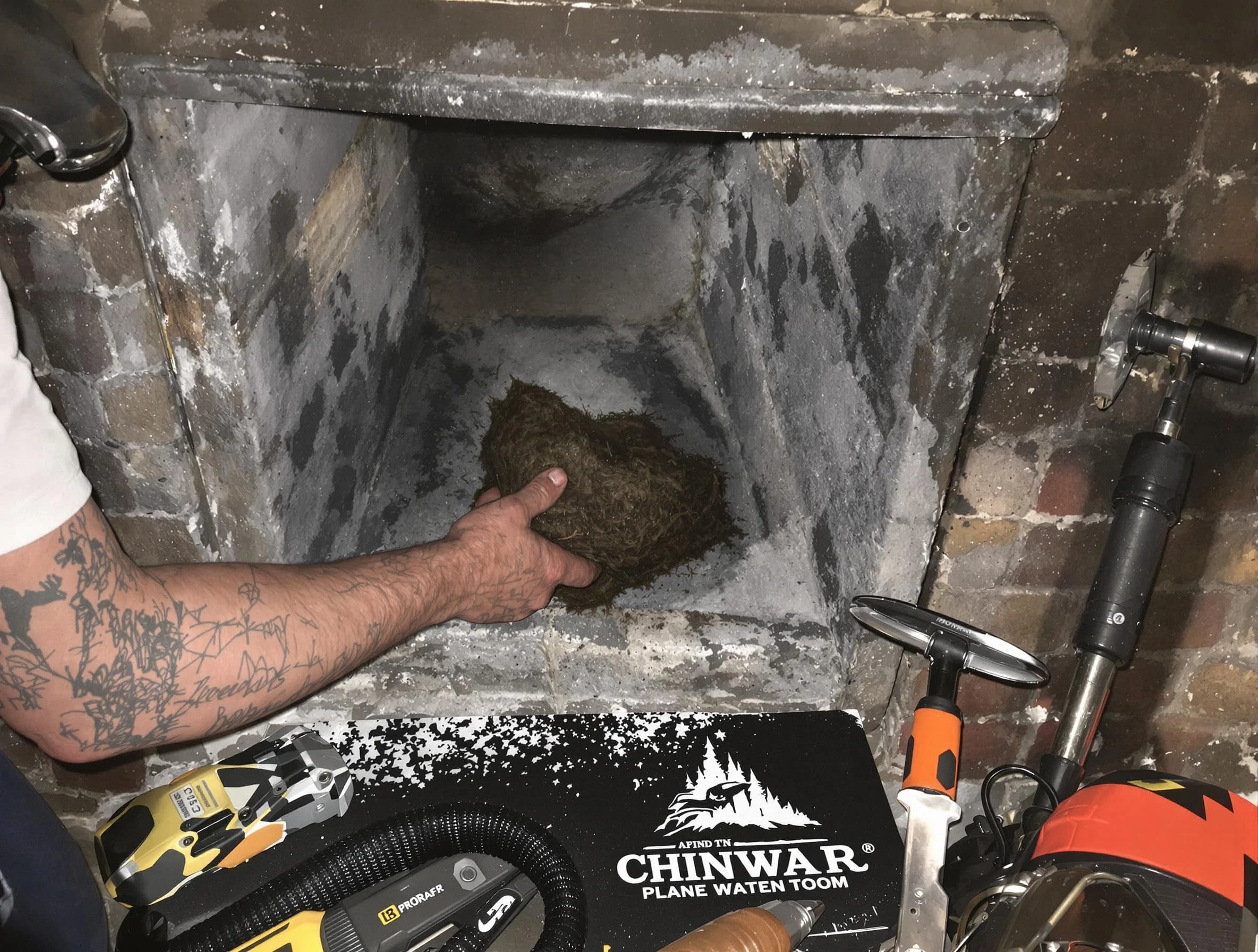 Lacey Chimney Sweep safely removing debris and screening chimney in Lacey, NJ